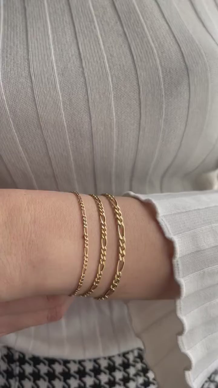 14K gold Figaro chain bracelet on wrist — product video (IMG-6829)